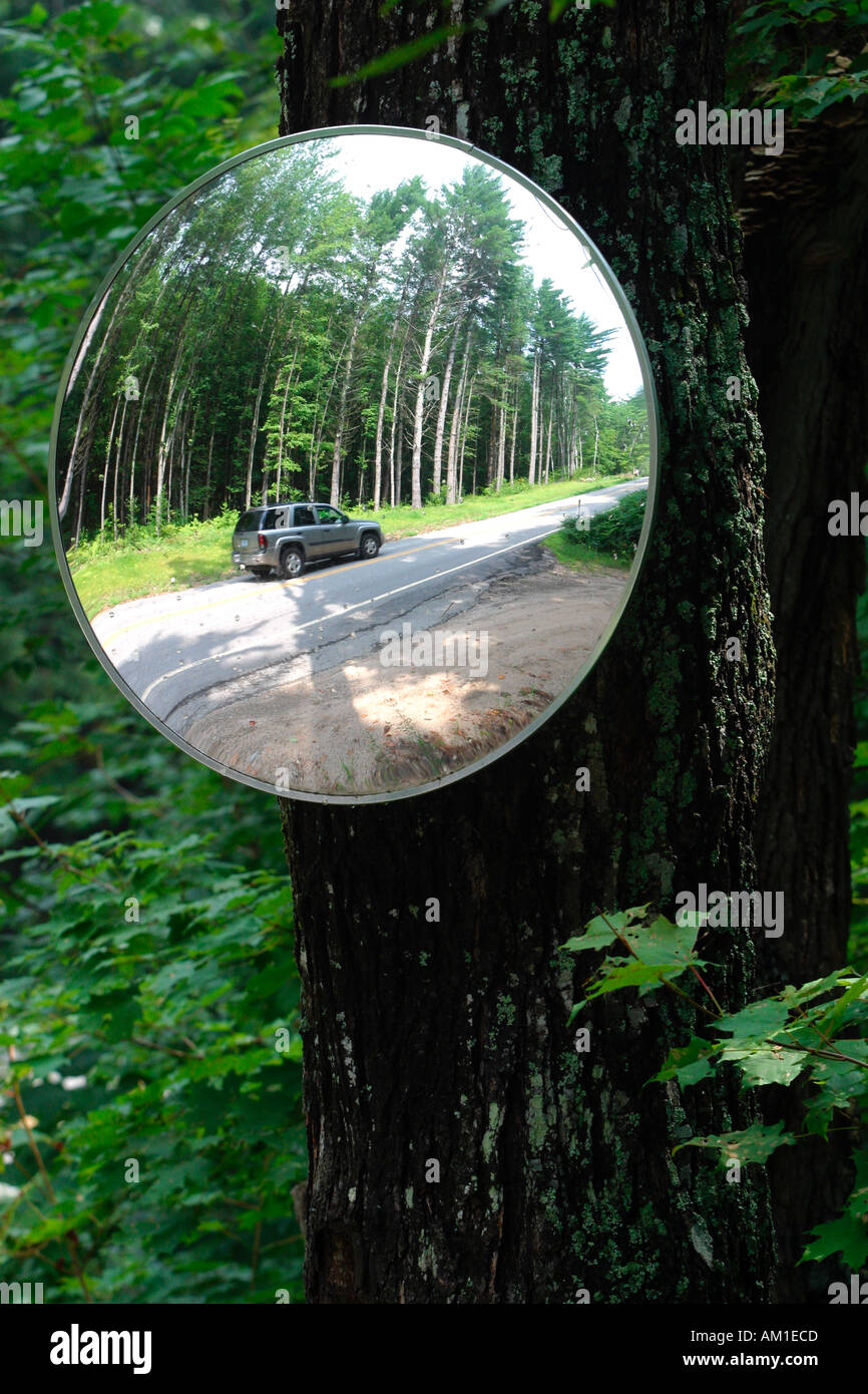 Car Reflection In Mirror on Country Road Woodstock Vermont Stock Photo