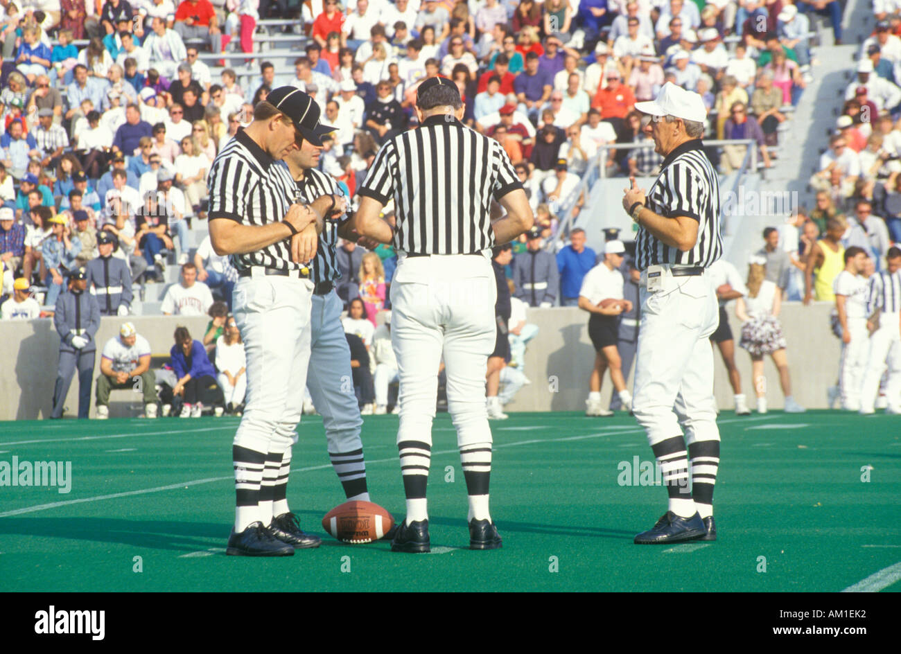Conversation between referees during Army Football game West Point NY Stock Photo