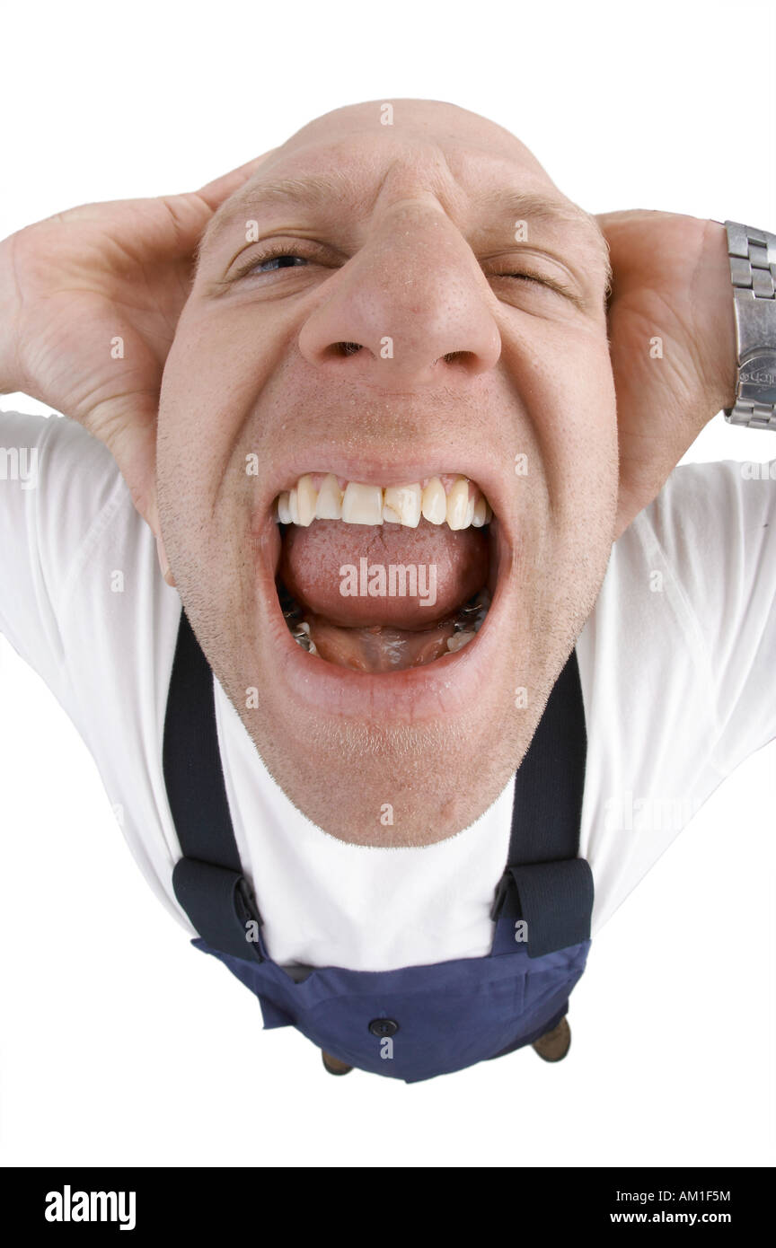 A man shouts into the fisheye of the camera. Stock Photo
