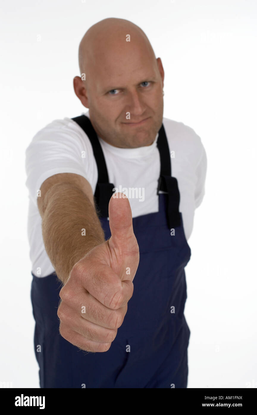 Craftsman with thumbs up Stock Photo