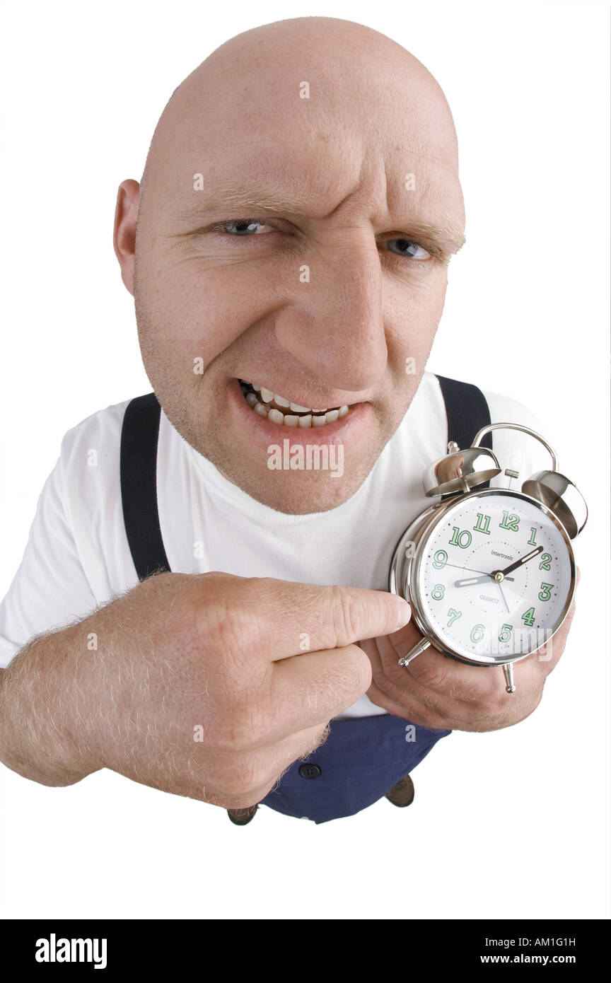 Man with alarmclock, seen through the fisheye lens Stock Photo