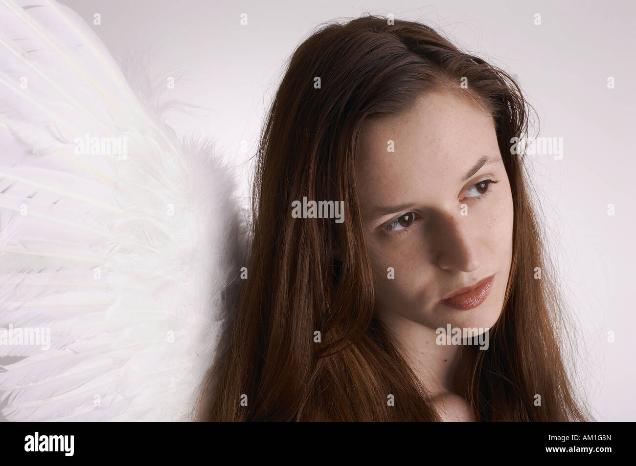 Portrait of an angel with brown eyes and hair Stock Photo