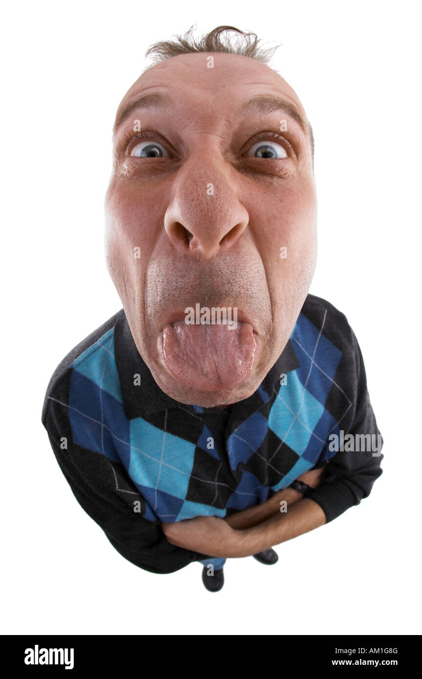 A man with outstreched tongue. Photo made with a fisheye-lens. Stock Photo