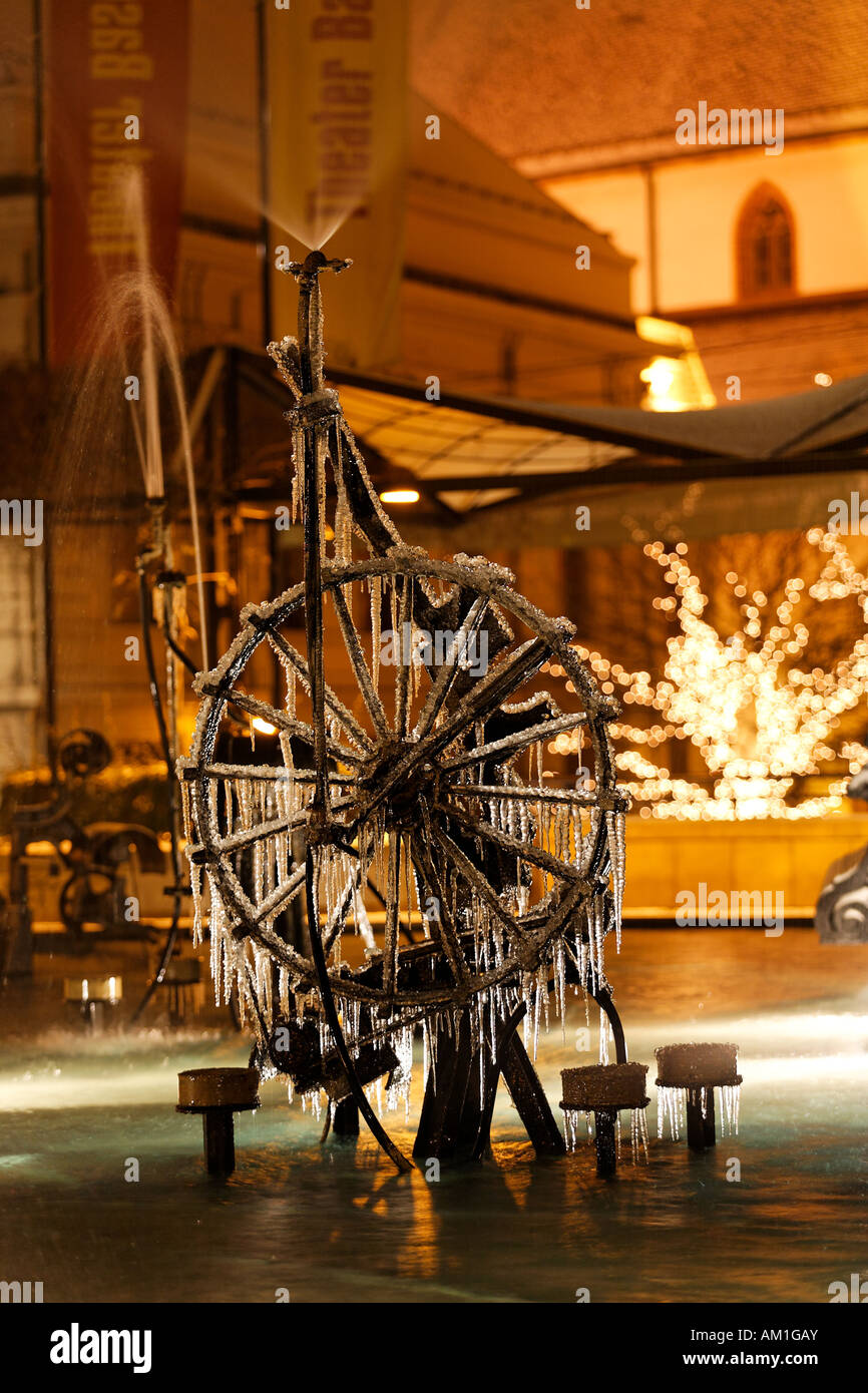Fountain of Jean Tinguely at the place of theater in Basle with icicles Basel Switzerland Stock Photo