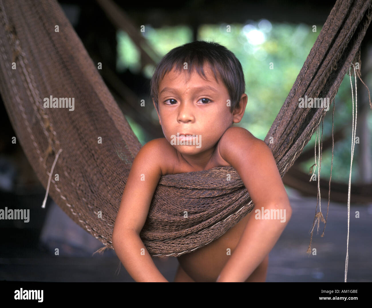 Warao Boy on Hammock Native People of Orinoco Delta Venezuela South America Stock Photo