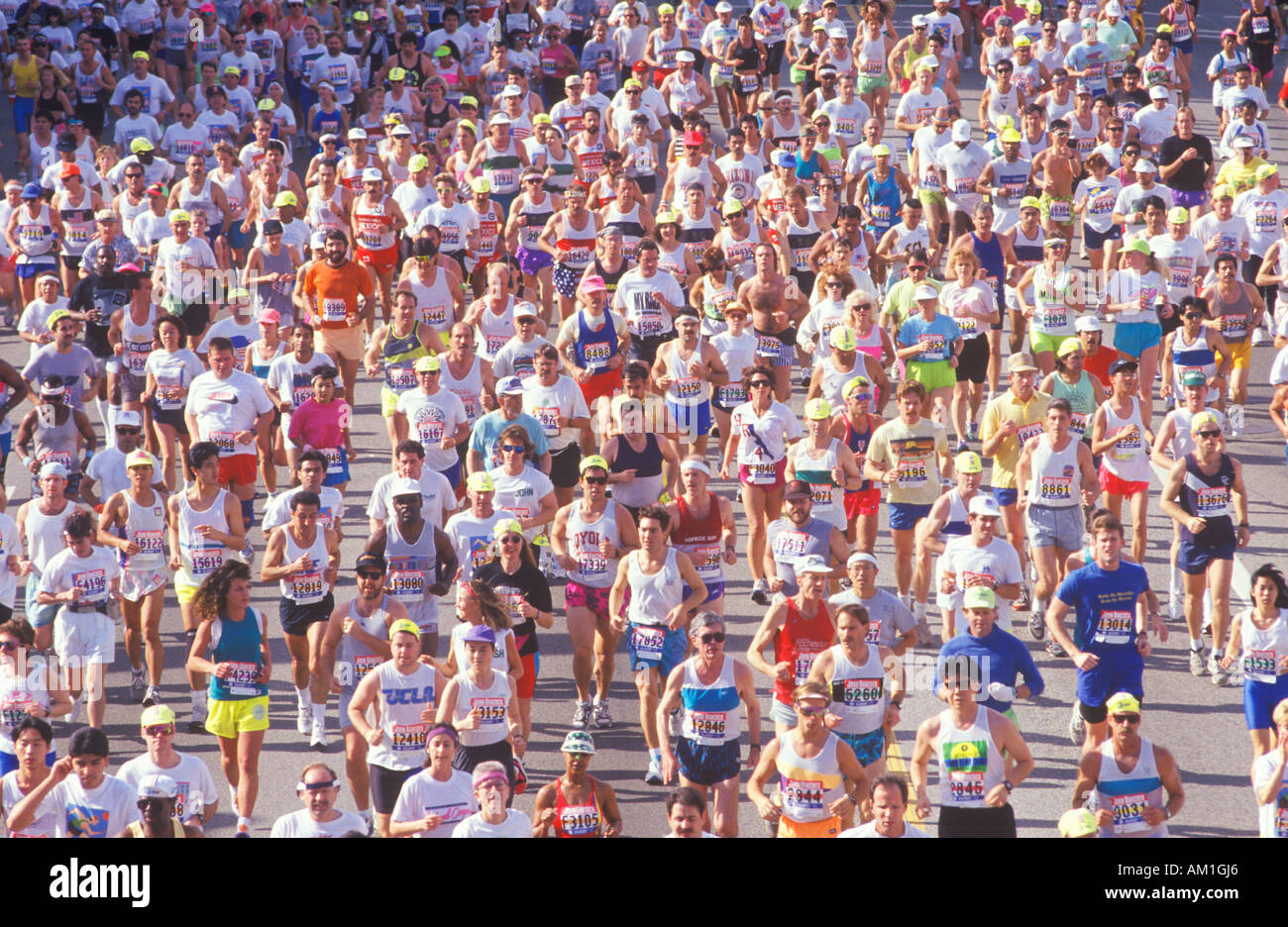 Runner on finish line being congratulated Los Angeles Marathon Los Angeles CA Stock Photo