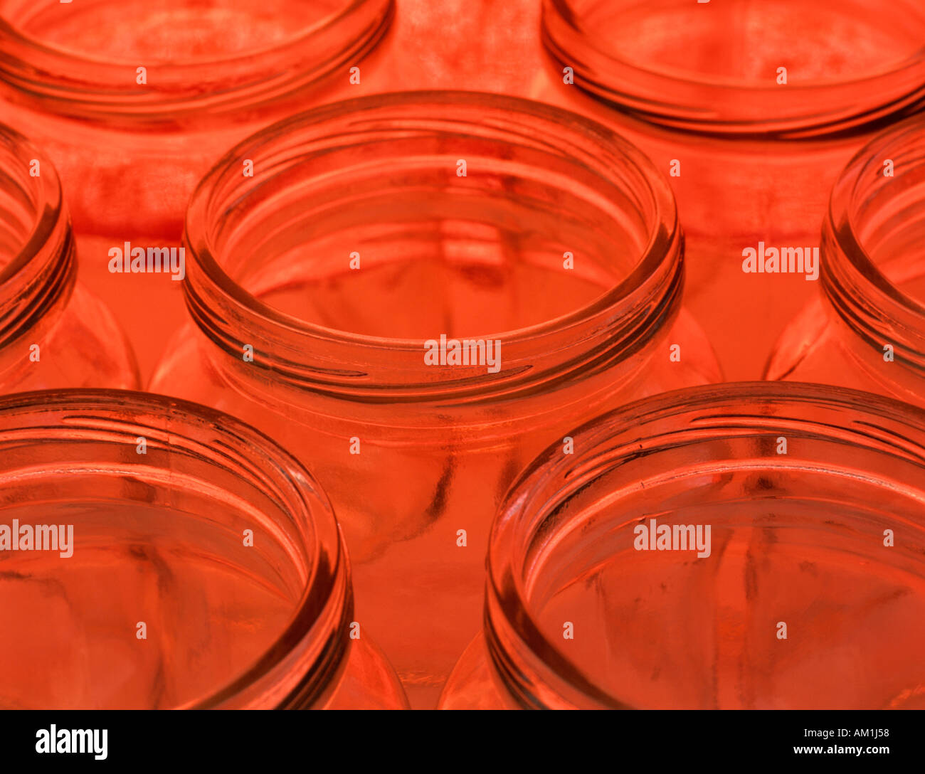 Download Empty Clear Glass Jam Jars With A Hot Orange Background Stock Photo Alamy Yellowimages Mockups