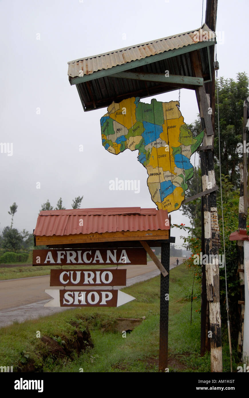 Sign Africana Curio Shop with map of Africa noth of Nairobi Kenya Stock Photo