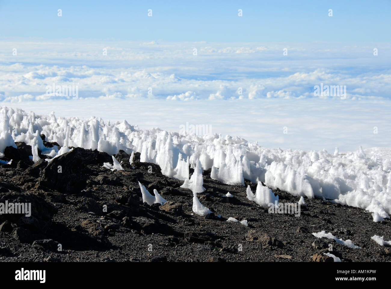 Bizarr harsh snow at crater rim Kilimanjaro Tanzania Stock Photo