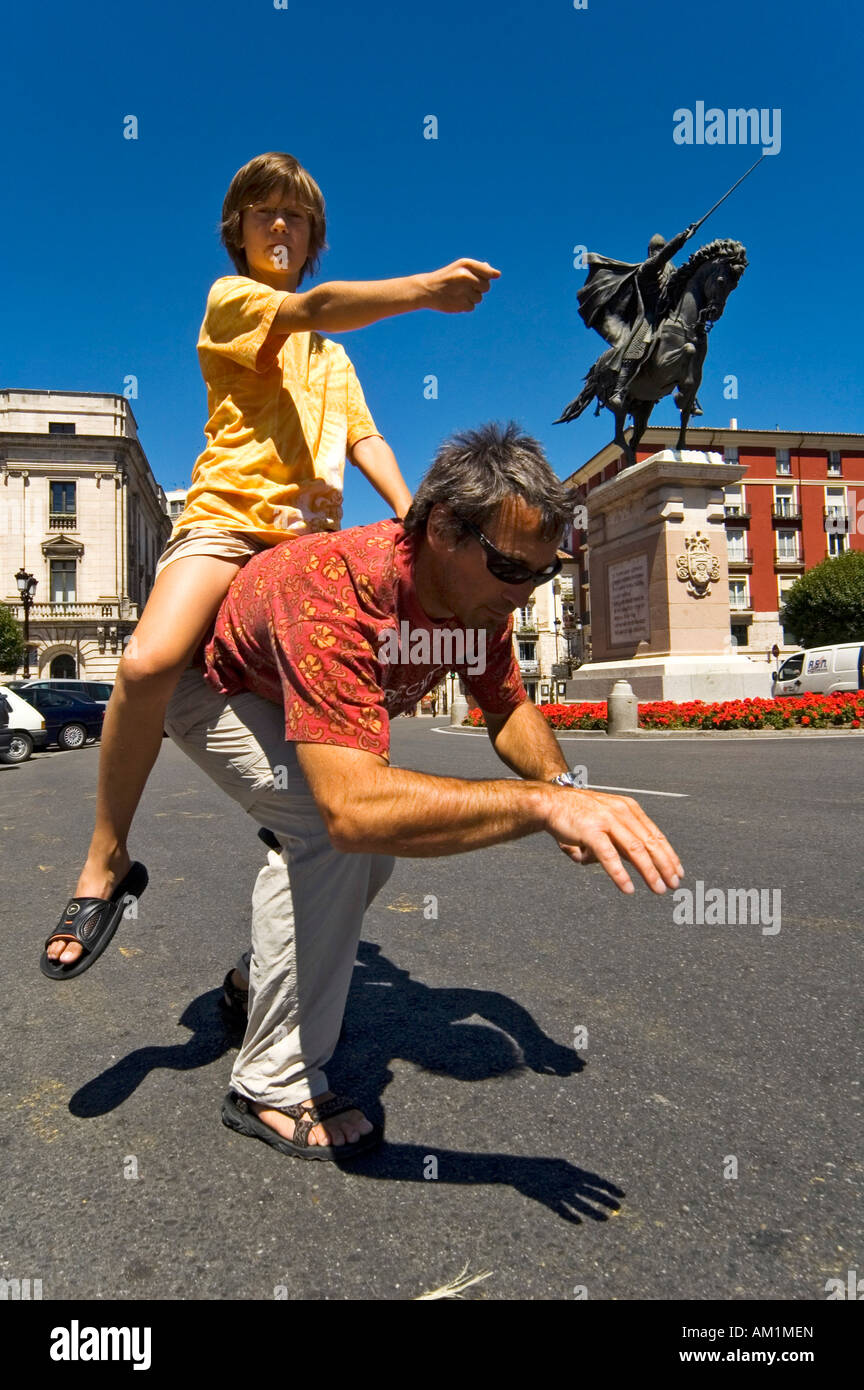 Father and son copying the Equestrian sculpture of the Spanish national hero El Cid, Castile, Spain Stock Photo