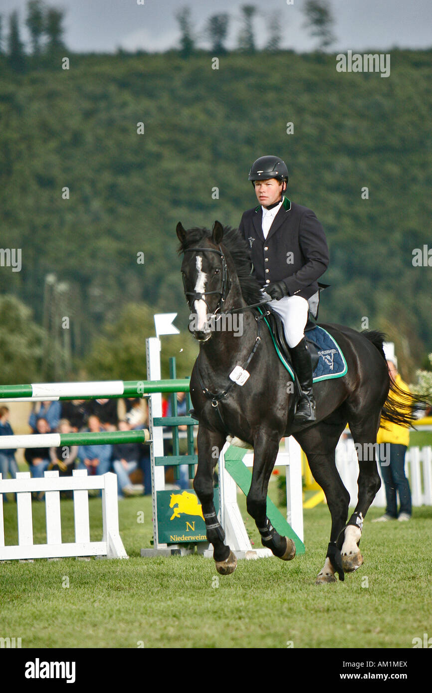 Show jumper Lars Nieberg, double Olympic champion and Emilio, Niederweimar, Germany Stock Photo