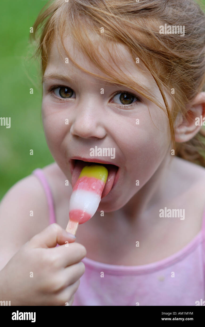 Little Girl Eating Ice Cream Iced Lolly Stock Photo Alamy