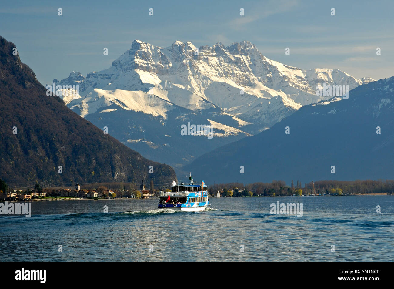 Ship excursion on Lake Geneva beneath the peaks of Dents du Midi, Montreux, Switzerland Stock Photo