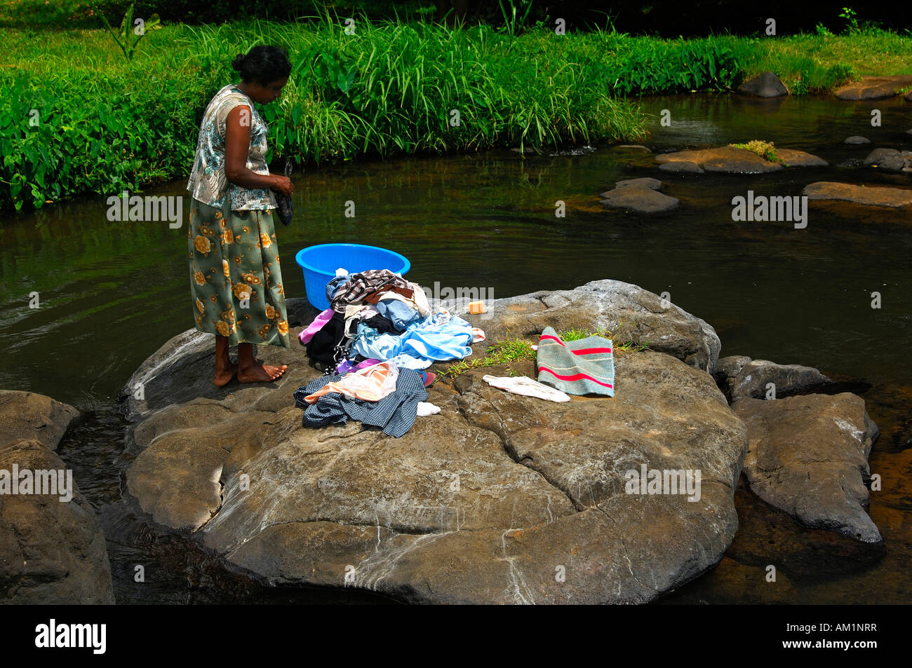 Laundry day by the river, Mauritius Stock Photo