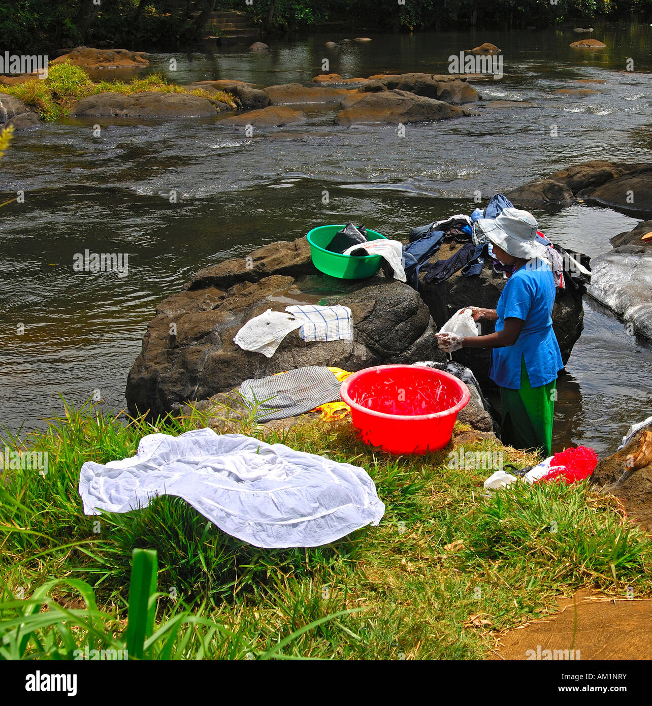 Laundry day by the river, Mauritius Stock Photo