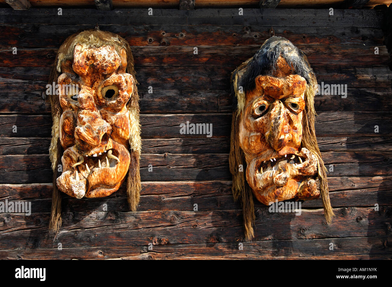 Traditional wooden mask made of Swiss pine wood, Wiler, Loetschental, Valais, Switzerland Stock Photo
