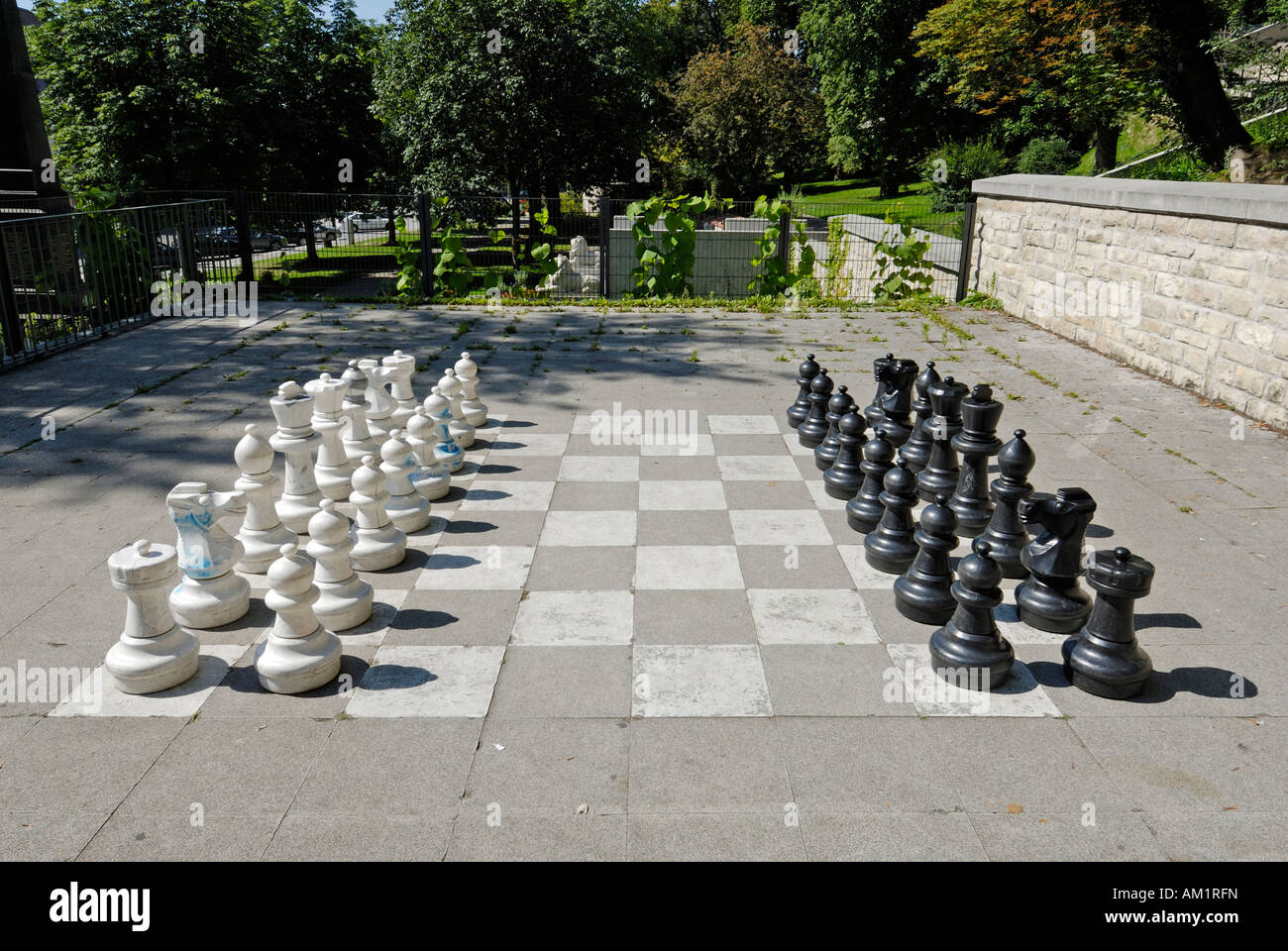 Chess pieces in starting position on a wooden Board Stock Photo by  ©Rostislavv 141334490