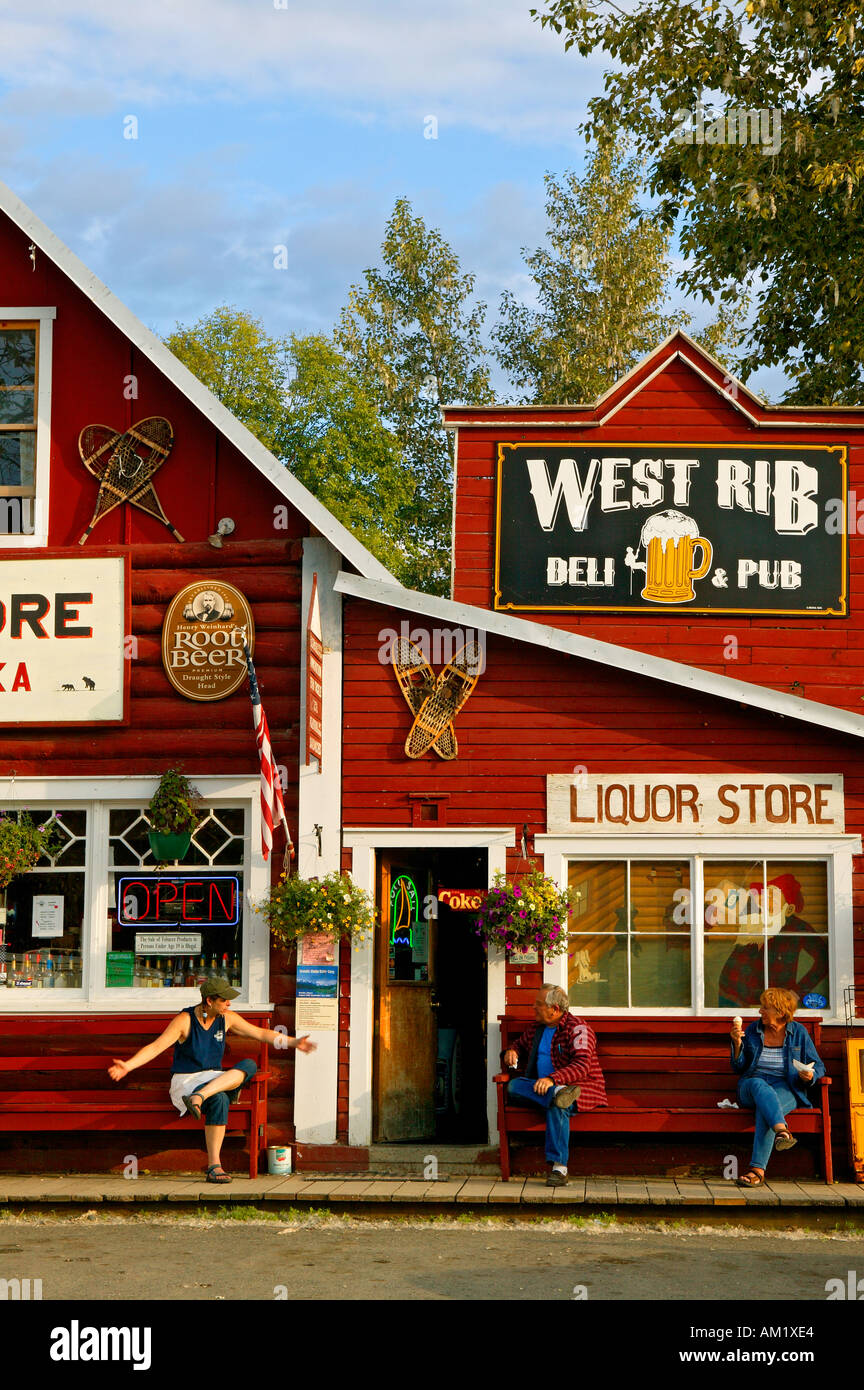 Visitors telling stories and eating ice cream Talkeetna Alaska Stock Photo  - Alamy