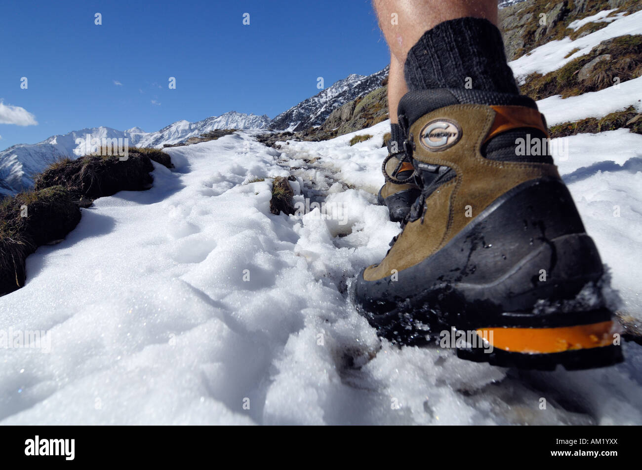 Feet and climbing boots of a hiker, Texelgruppe, South Tyrol, Italy Stock Photo