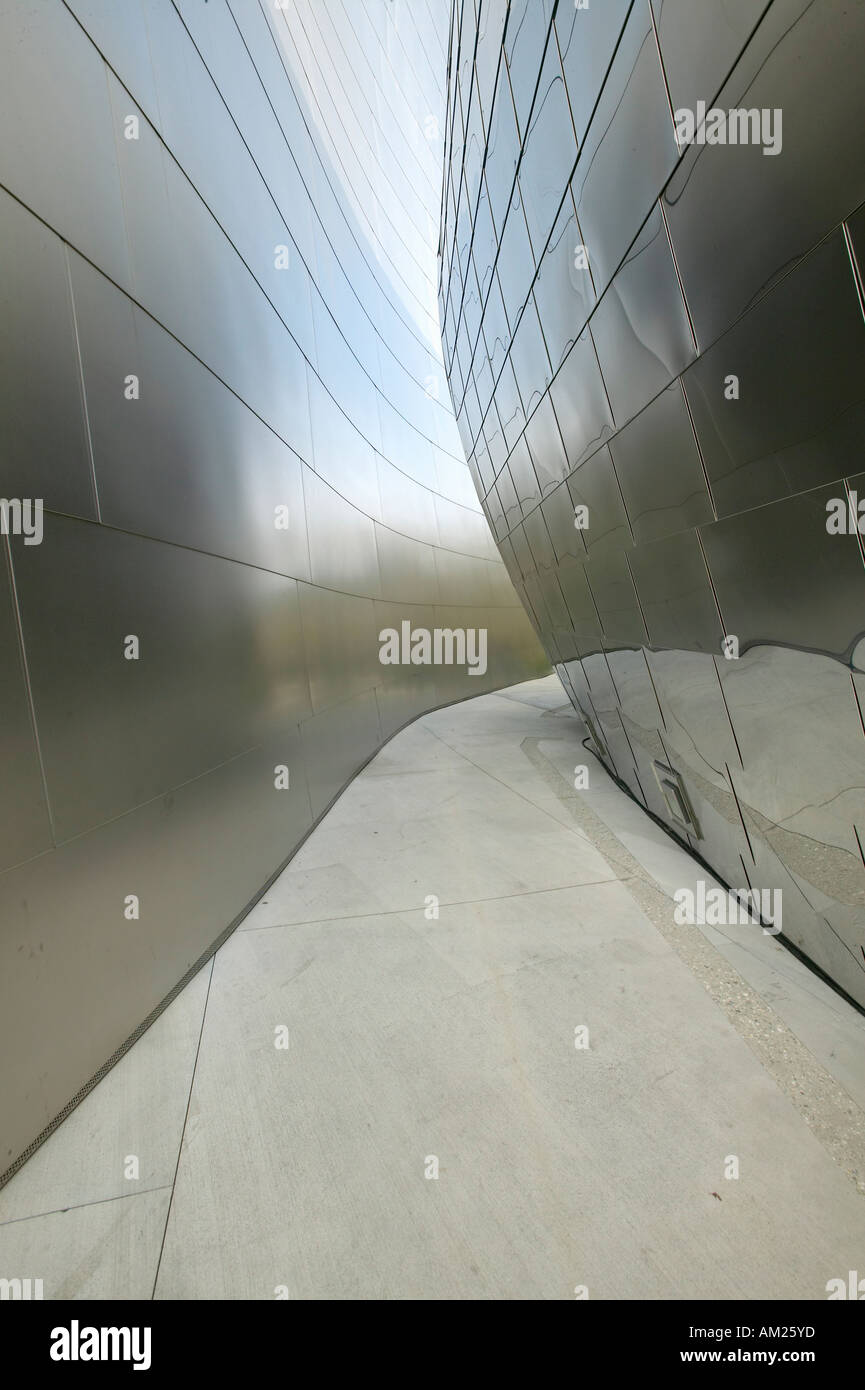 Walkway between stainless steel walls of Disney concert Hall designed by Frank Gehry in downtown Los Angeles California Stock Photo