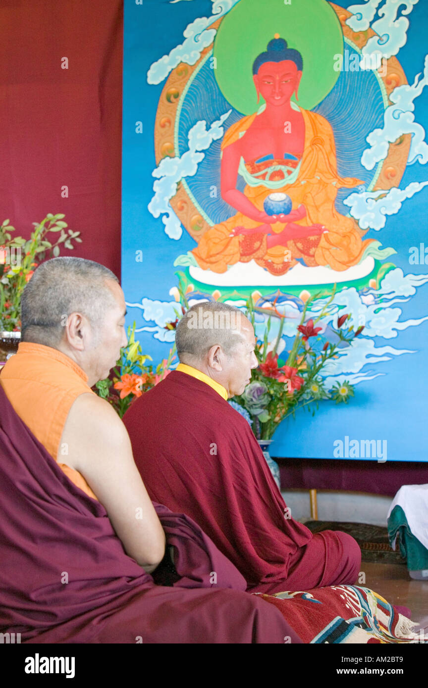 Tibetan Monks with painting of Buddha Amitabha at Amitabha Empowerment