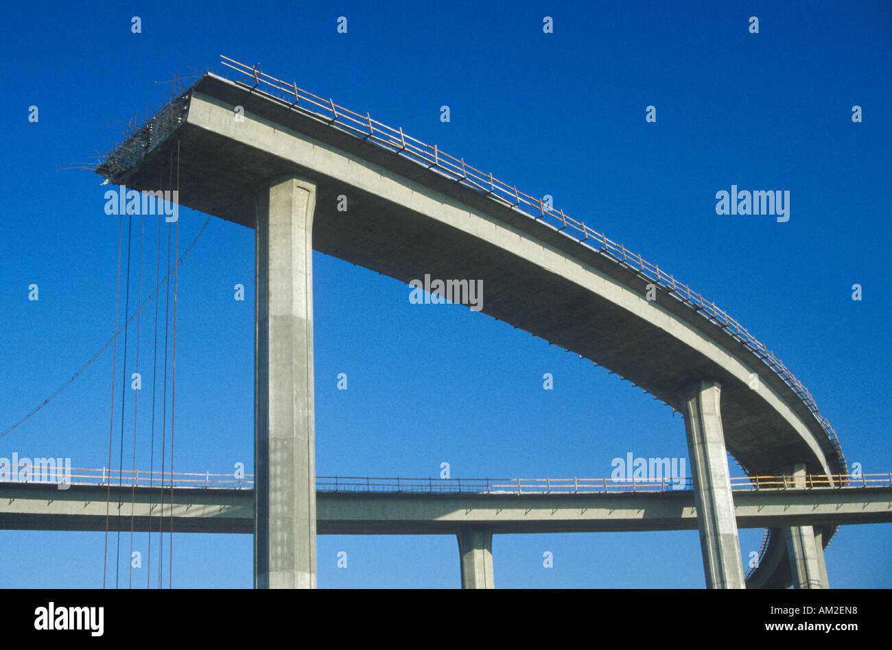 Freeway Structure A concrete freeway structure ends abruptly with iron support structures ...