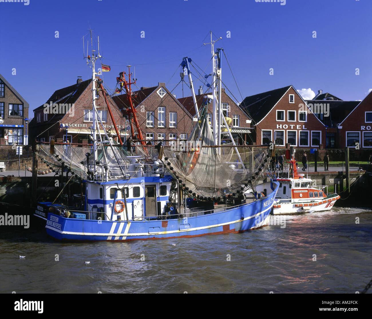 geography / travel, Germany, Lower Saxony, Neuharlingersiel, harbour, fishing port, fishing boat, buildings, Additional-Rights-Clearance-Info-Not-Available Stock Photo