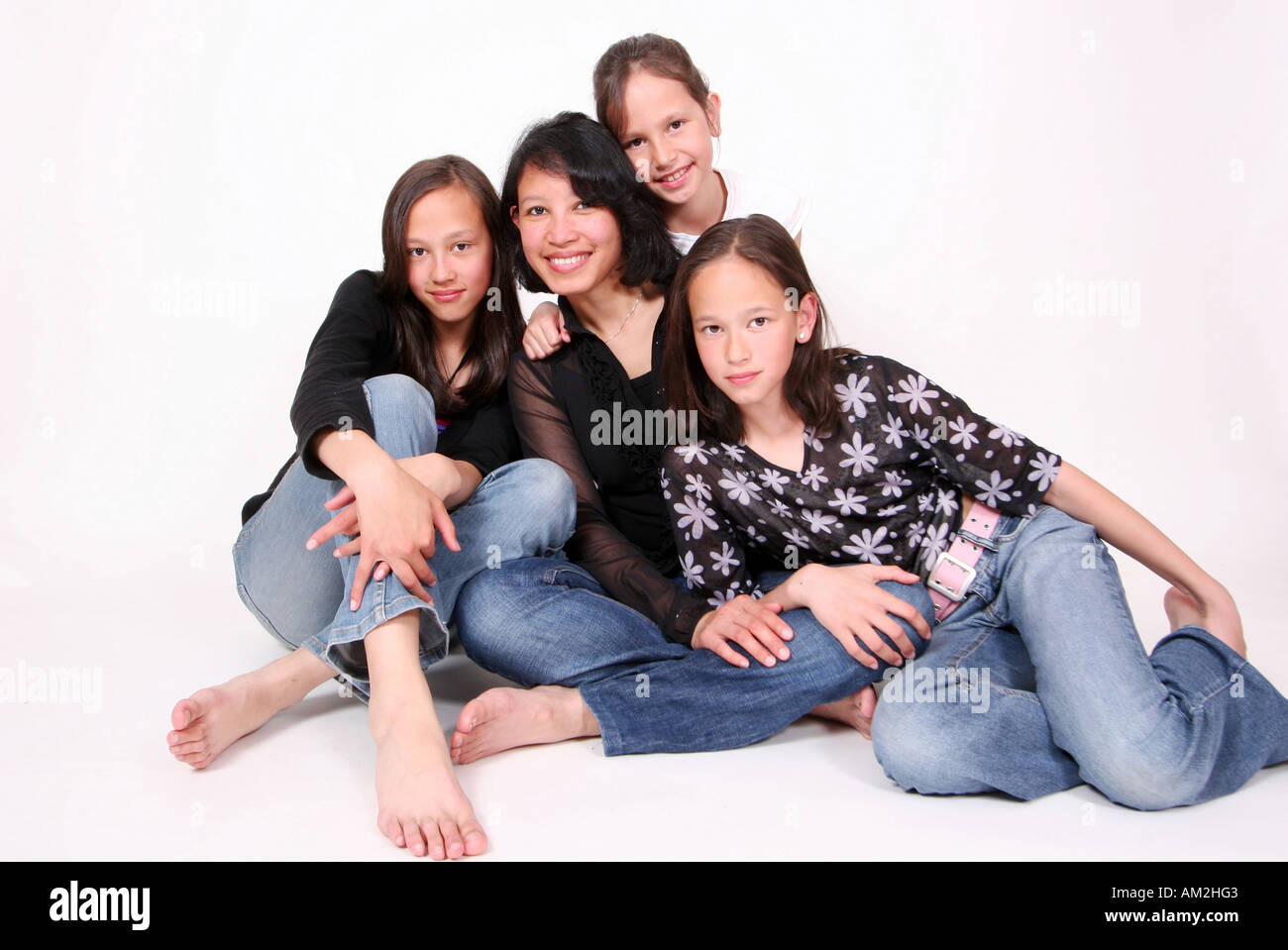 family portrait mother with three daughters Stock Photo