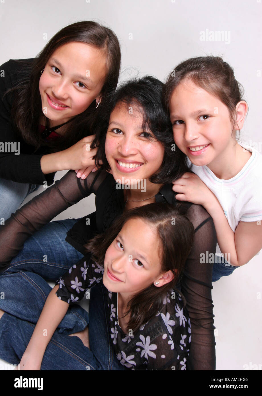 family portrait mother with three daughters Stock Photo