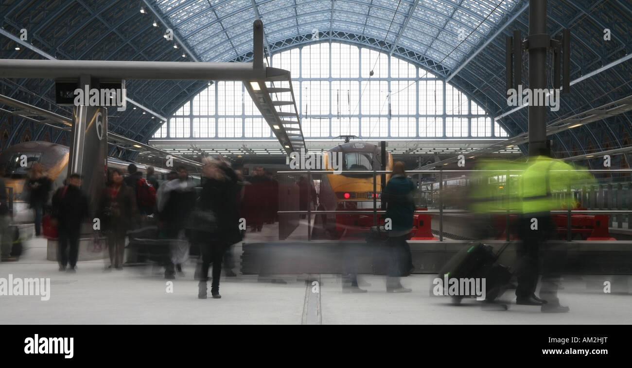 Passengers disembark from a Euro Star train at St Pancras Station London Stock Photo