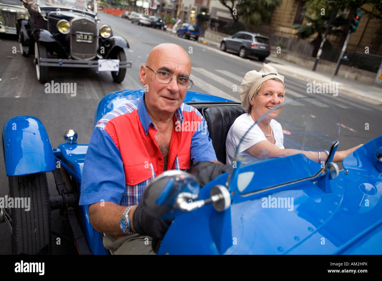 Couple in an vintage classic car touring in Sicily Stock Photo