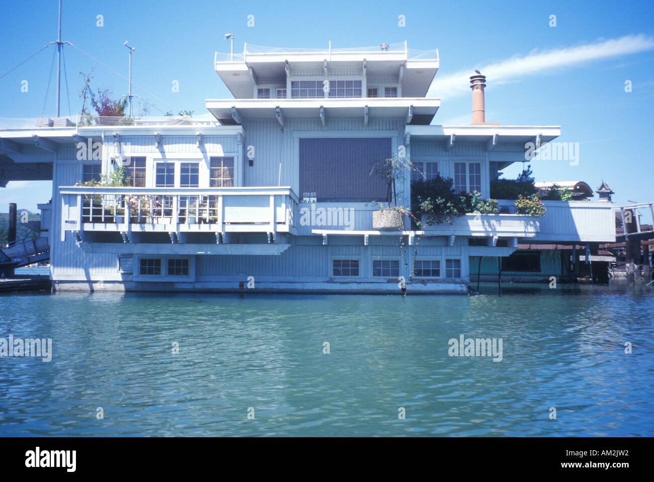 A pair of houseboats moor next to each other in Sausalito s harbor California Stock Photo