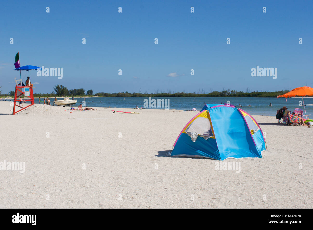 Wind blows tent on swimming beach at Ft De Soto Park in Florida USA
