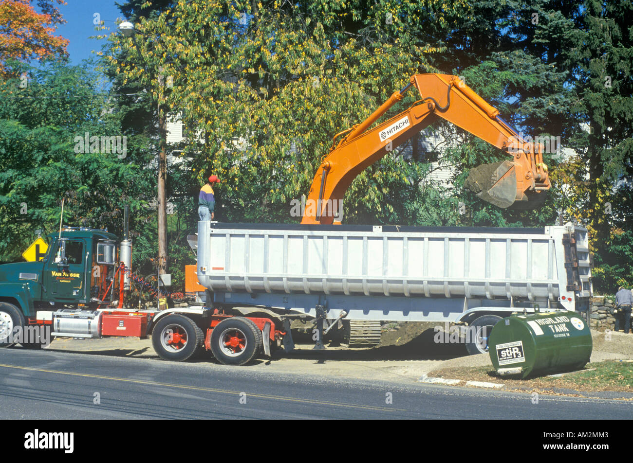 Installing tank in New England Stock Photo