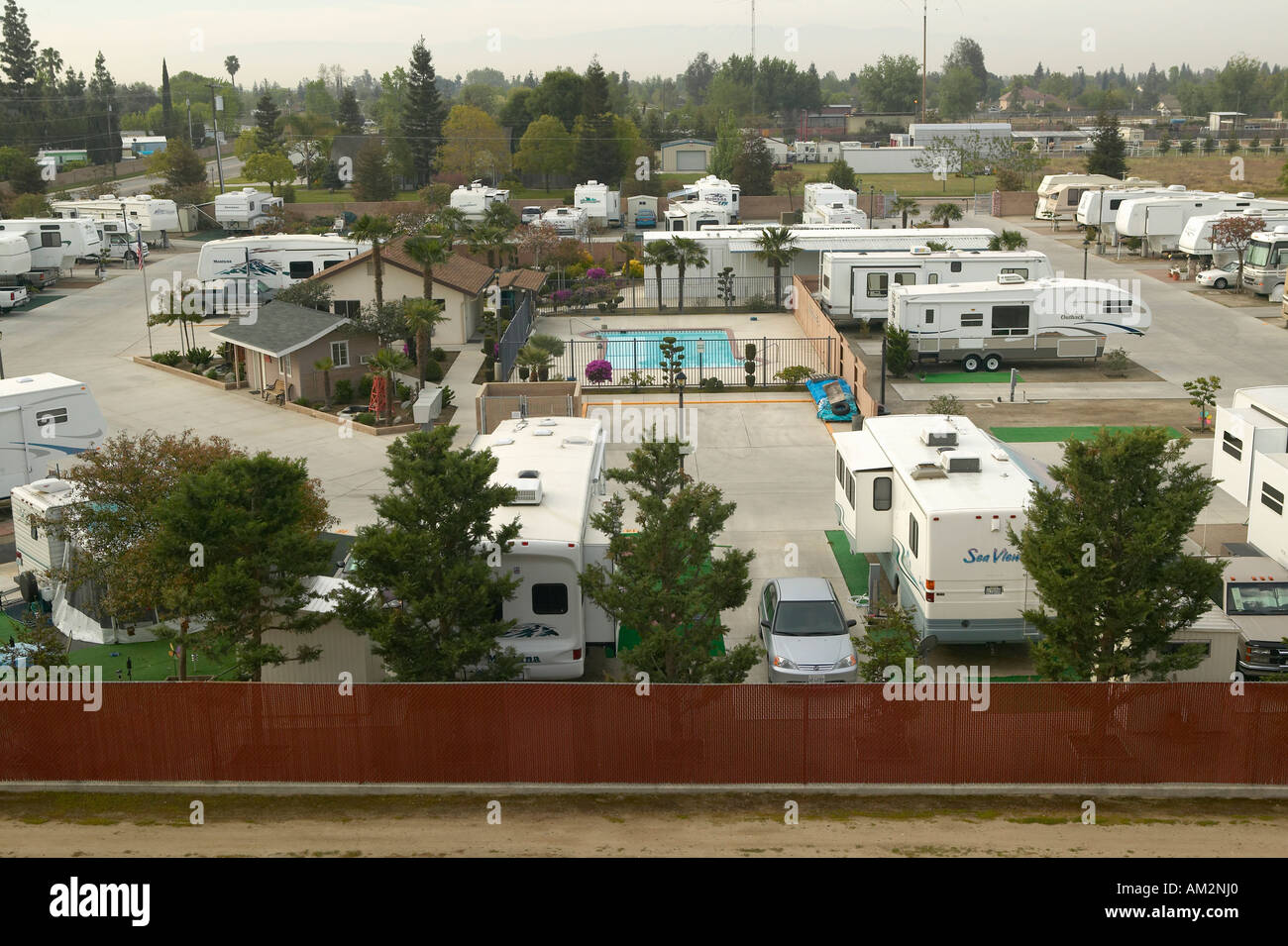 An overview of Recreational Vehicles and trailers parked in a trailer camp outside of Bakersfield CA Stock Photo
