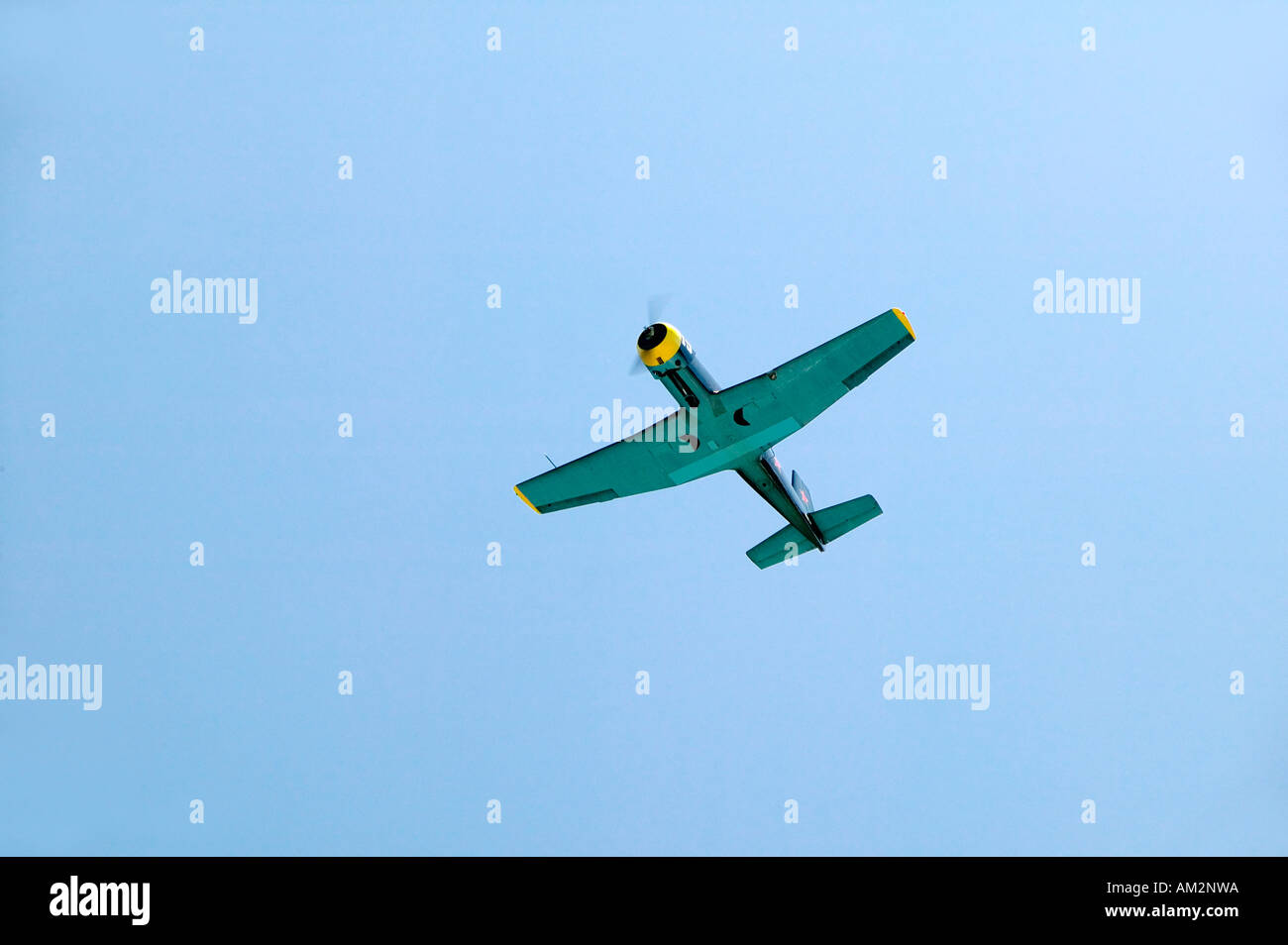 Chinese training plane releasing smoke over Ojai California during Veteran s Day event Stock Photo