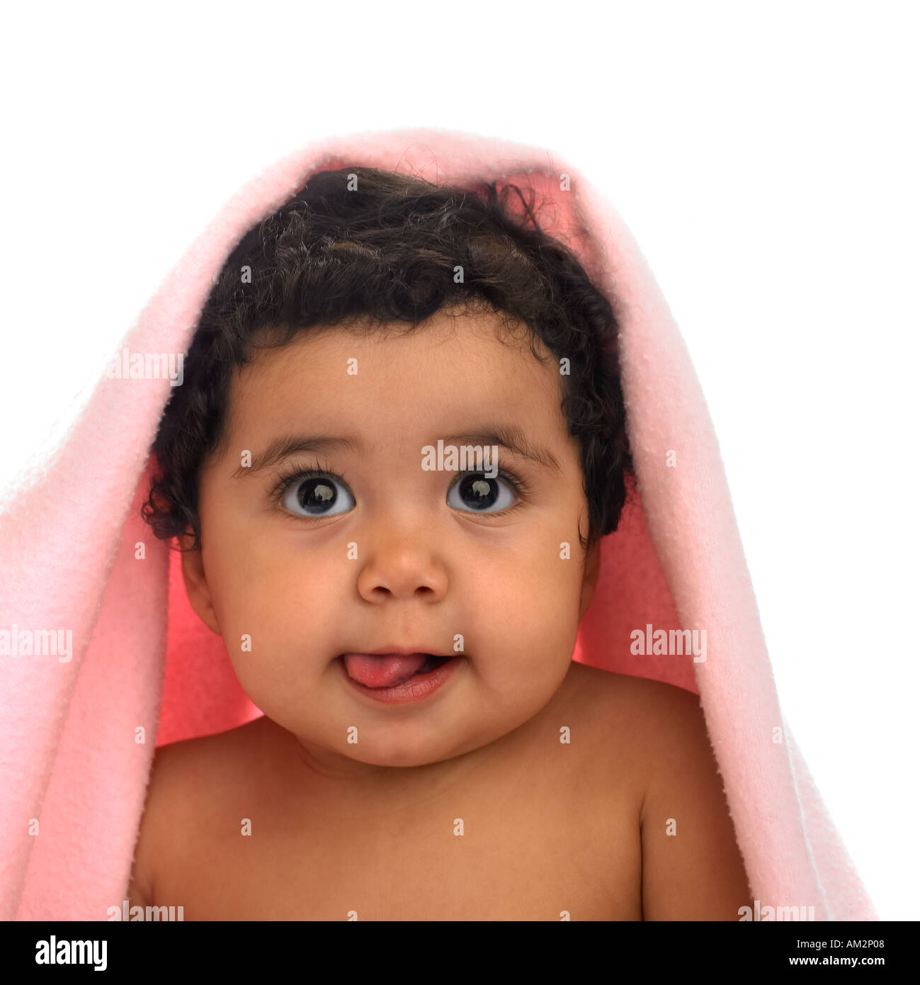 Cute baby with blanket on her head Stock Photo Alamy