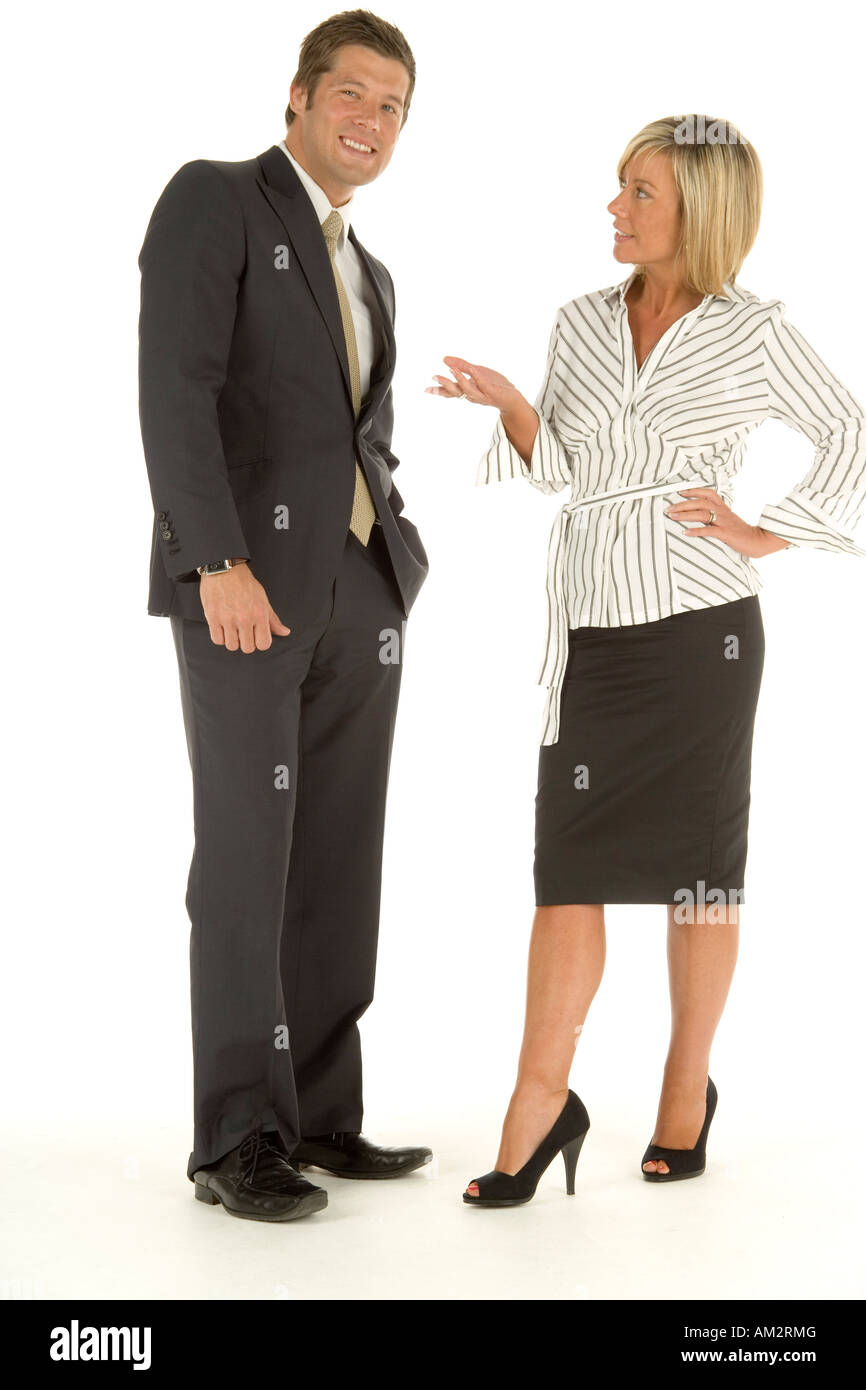 Young man and woman talking in the office against a white background ...