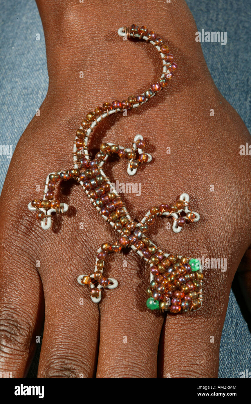 Hand with decoration made of glass beads, gecko, Cape Town, South