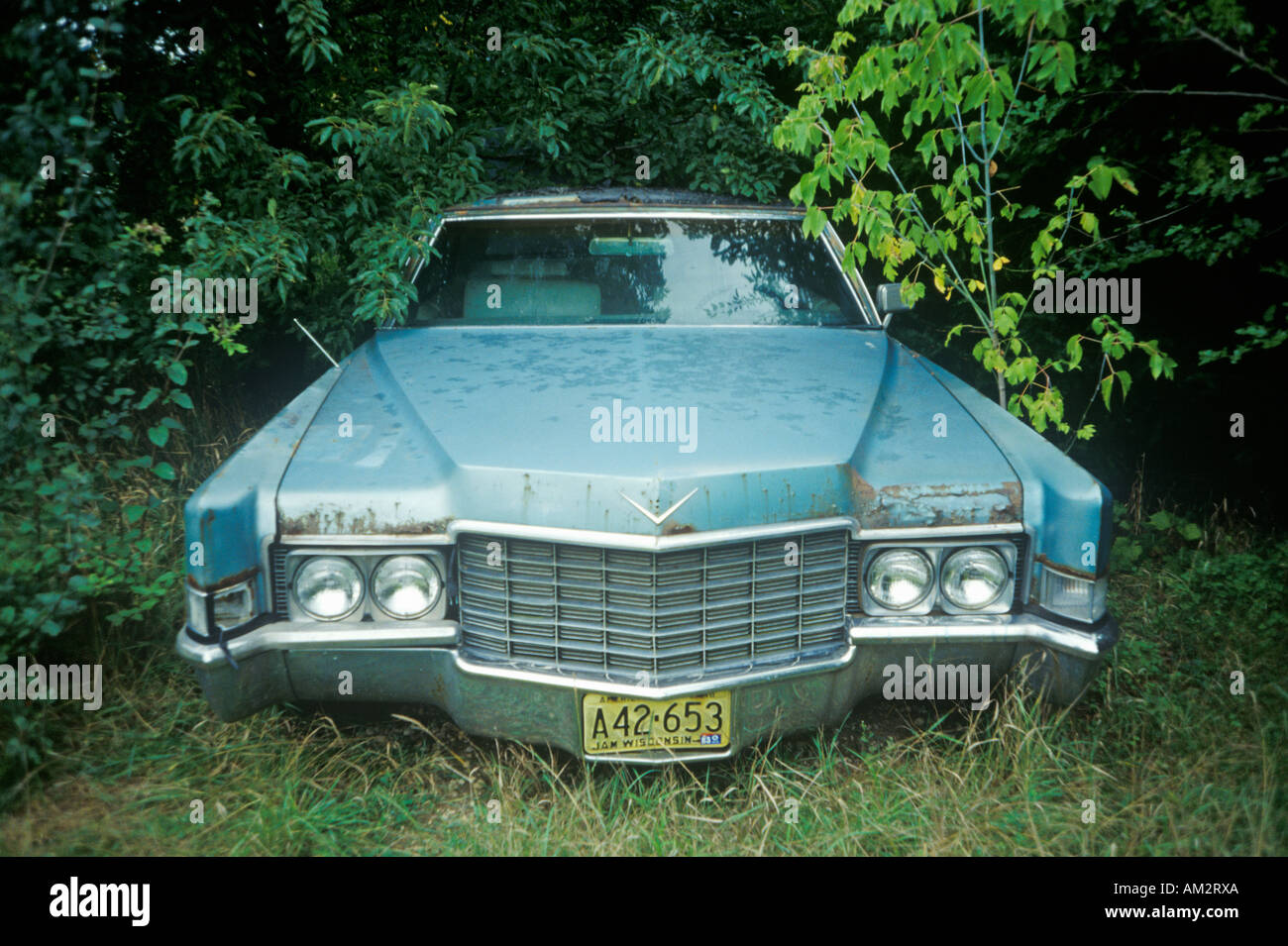 An abandoned light blue classic car in Wisconsin Stock Photo