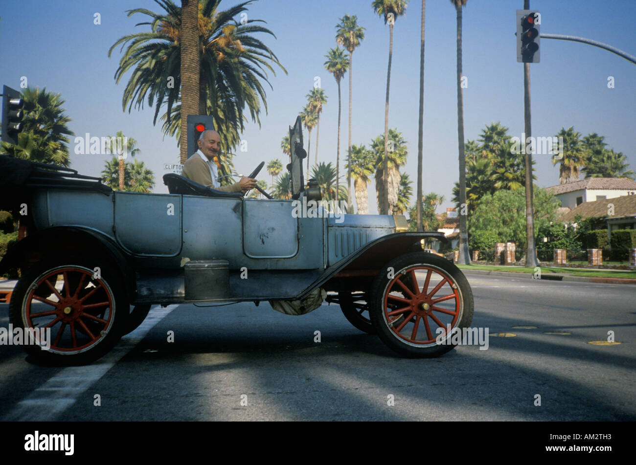 A man driving a model T car in Los Angeles CA Stock Photo