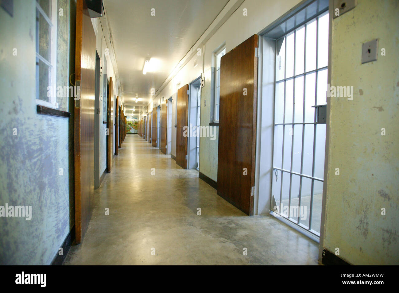 Corridor leading to the cells on the former prison island Robben Island, South Africa Stock Photo