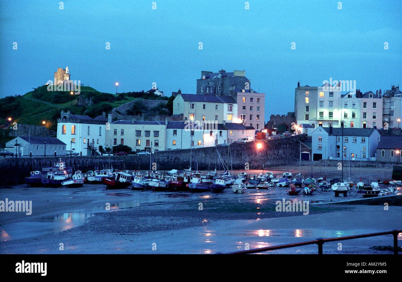 Tenby harbour at night in Pembrokeshire Wales Stock Photo