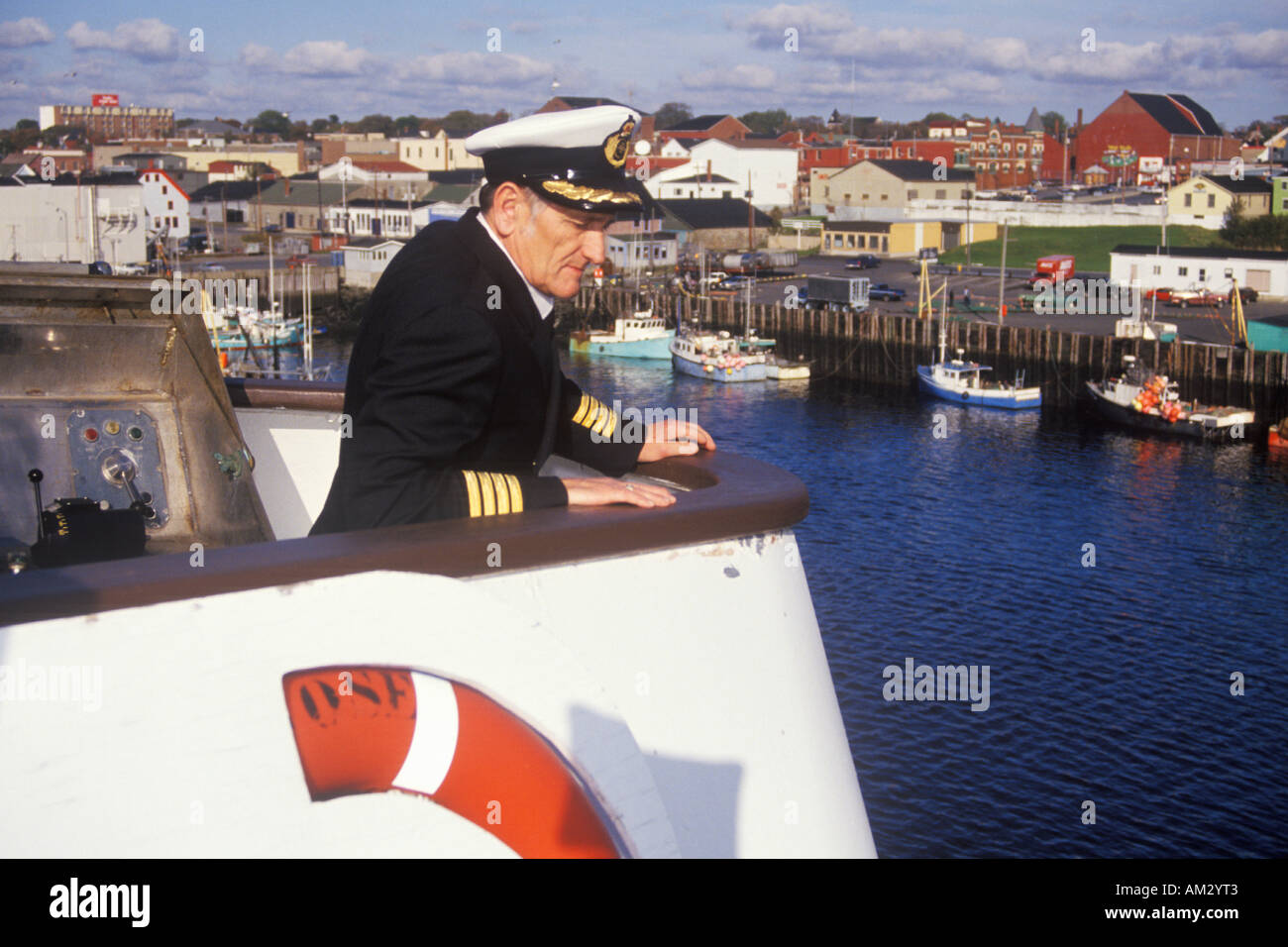The captain of the Bluenose atop the ferry to guide it into the dock Yarmouth Nova Scotia Stock Photo