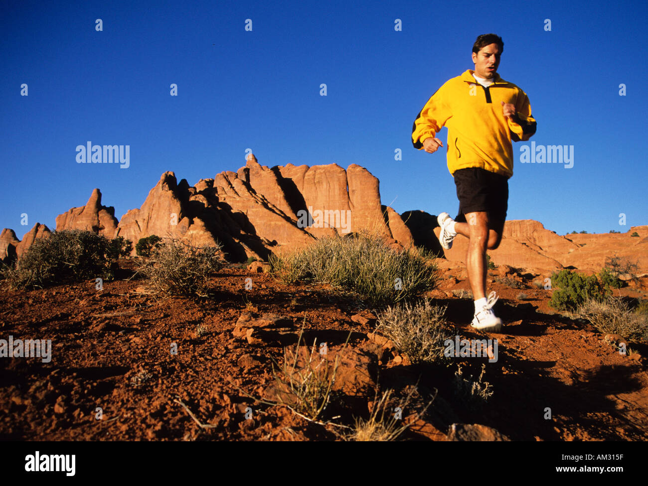 sport sports running in Arches National Park Utah USA Stock Photo