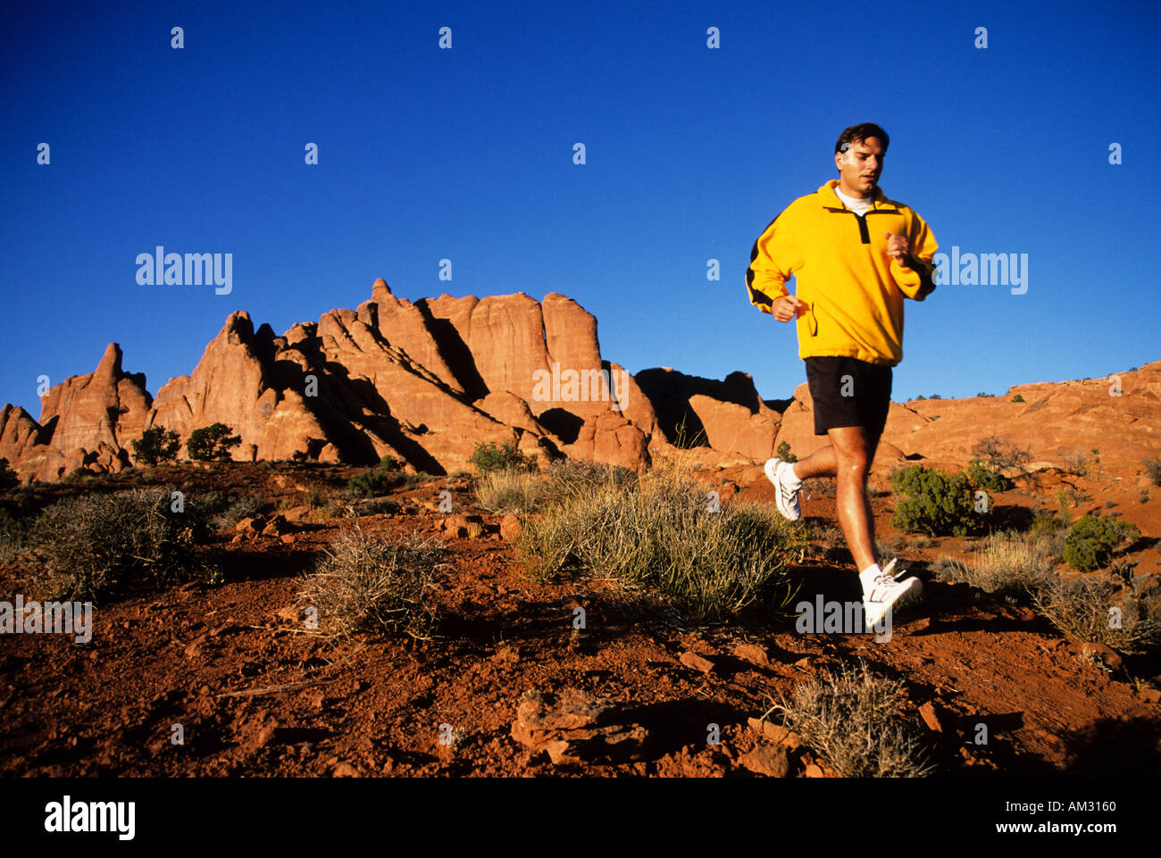 sport sports running in Arches National Park Utah USA Stock Photo
