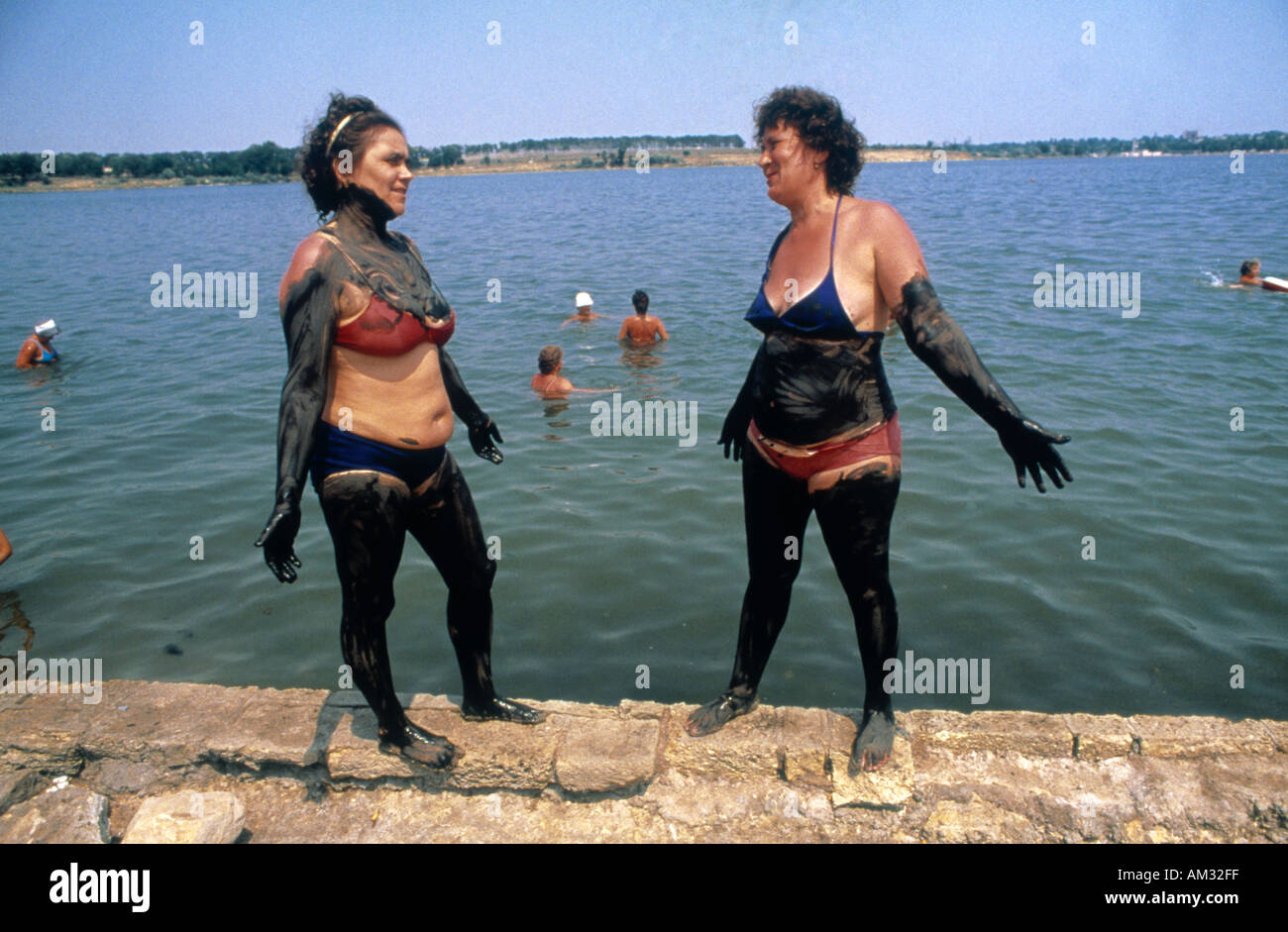 women enjoy the health benefits Techirghiol Lake Mud Baths in ...