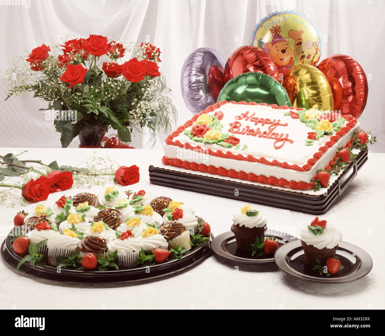 happy birthday cake ballons cupcake roses party assortment celebration holiday Stock Photo