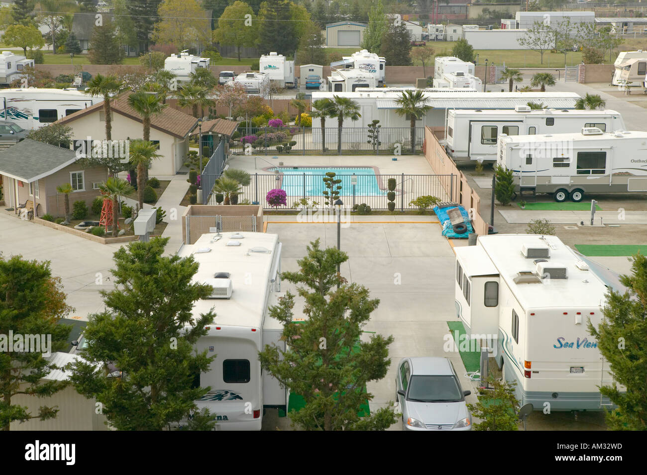 An overview of Recreational Vehicles and trailers parked in a trailer camp outside of Bakersfield CA Stock Photo