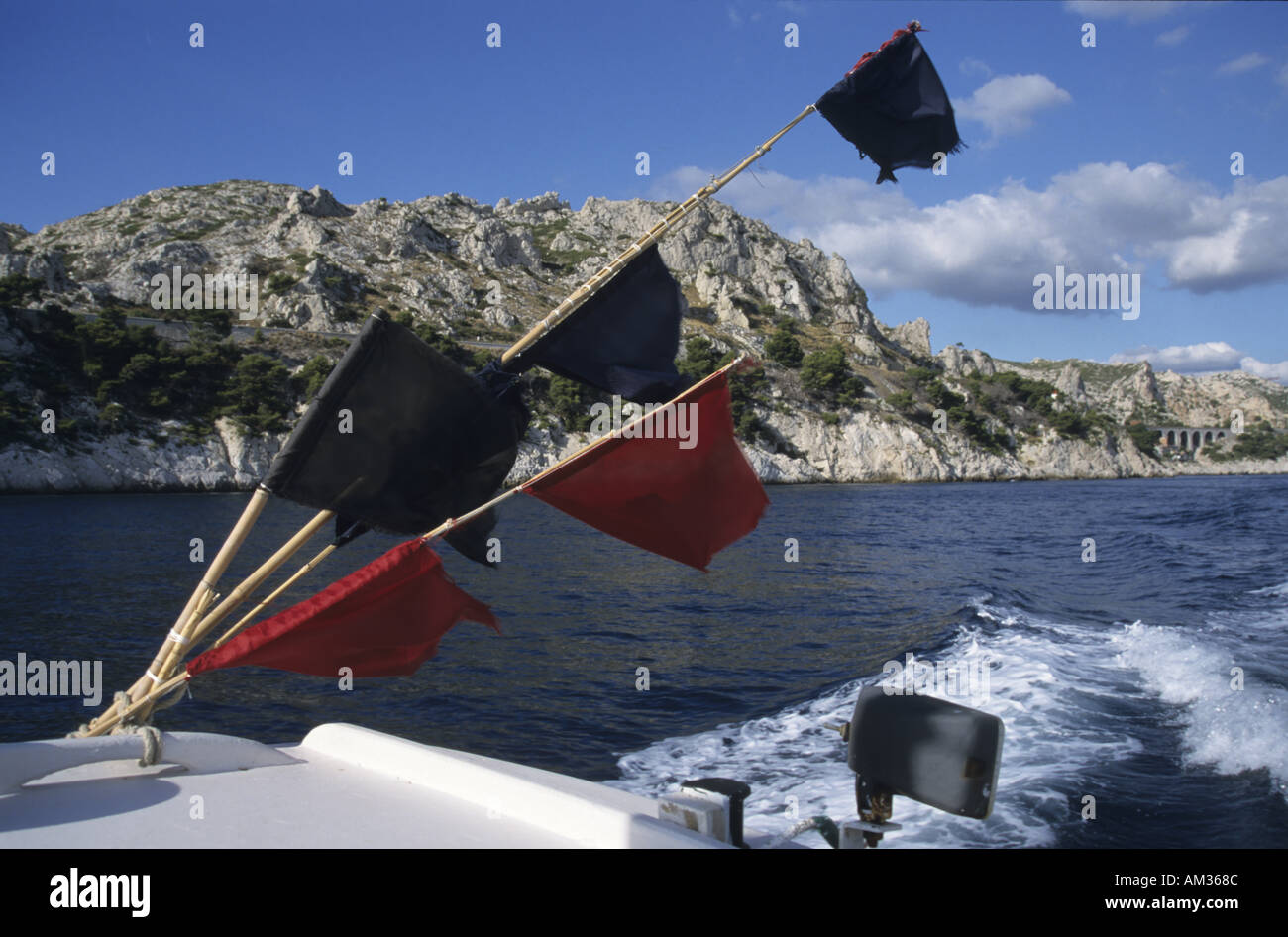 France marseille estaque red and black flags of nets on a fisherman boat Stock Photo